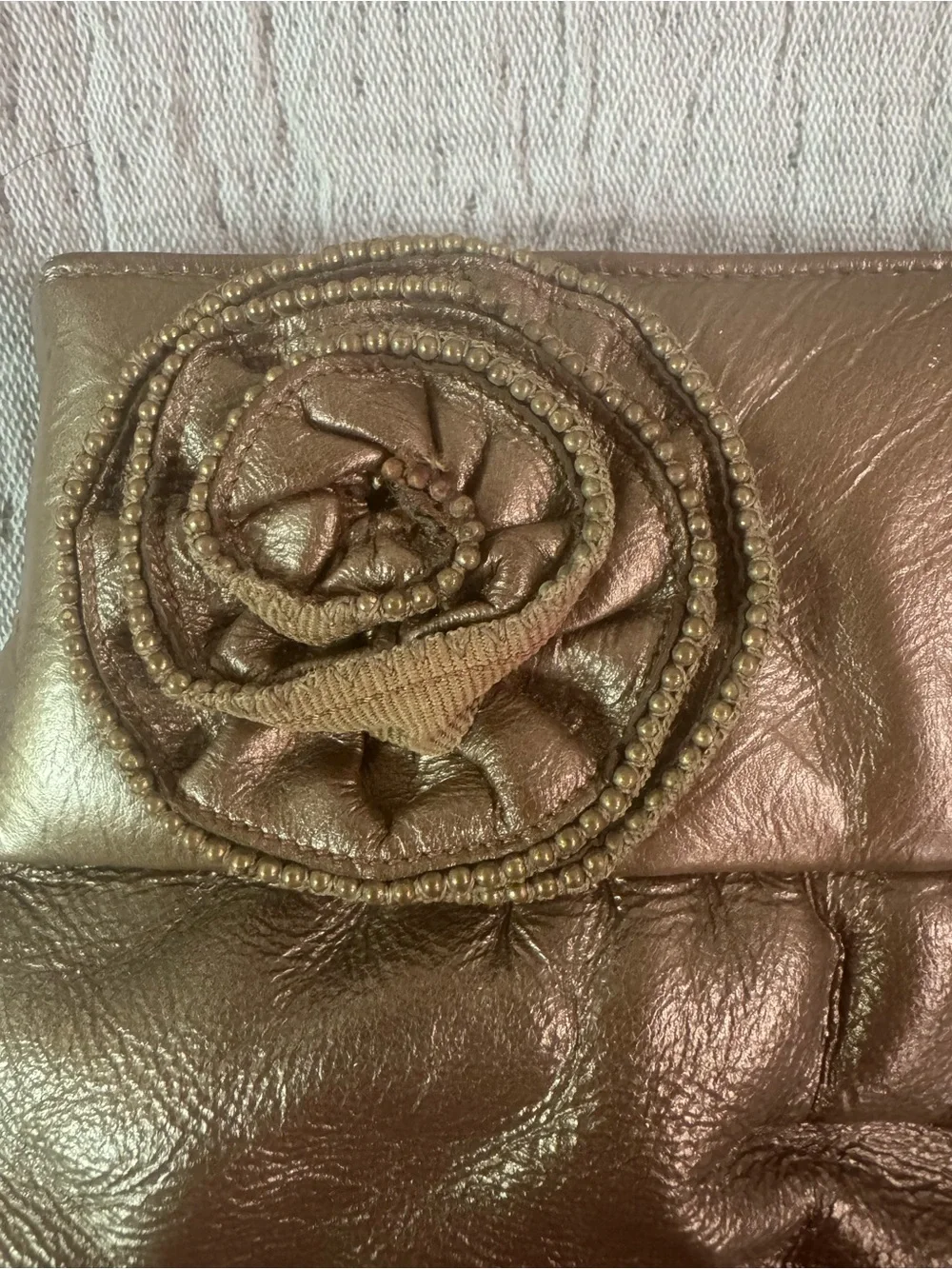 VTG Stuart Weitzman Metallic Bronze Hinge Open Clutch with Zipper Rosette